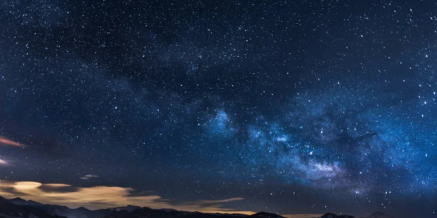 Starry night sky representing the journey of 'overnight' successes, filled with countless stars each symbolizing the unseen efforts and challenges overcome.