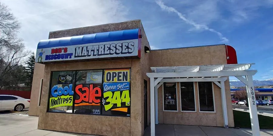 Mattress store front advertising $344 for a queen size at Bob's Mattress